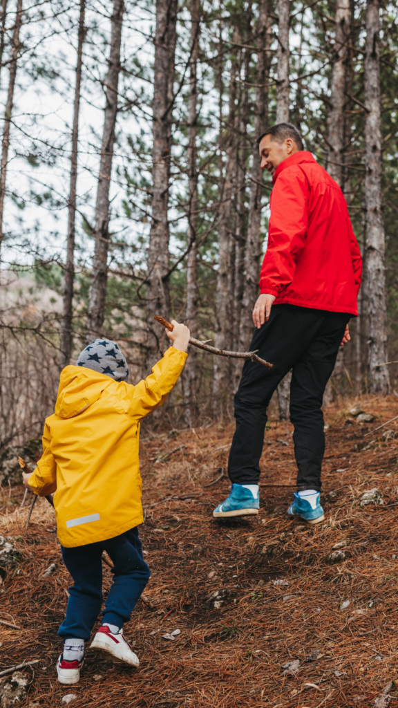 Dad hiking with child